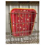 Metal basket of vintage trays