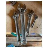 Adjustable wrenches