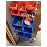 Plastic parts bins with spark plugs and misc