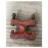 Sickle section rivet tool