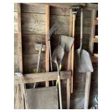 Shovels, pitch fork, wall contents