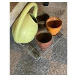 Pots and watering can