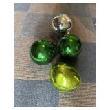 Lit small gazing balls
