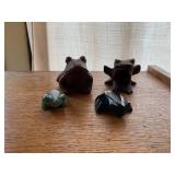 Carved frogs