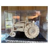 Wooden tractor in display box