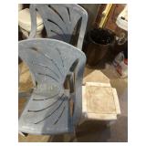 Plastic lawn chairs and side table
