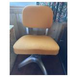Vintage orange rolling desk chair