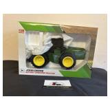 John Deere battery operated tractor 4- wheel drive