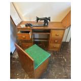 Universal sewing machine in cabinet and