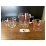 Pyrex and glass measuring cups