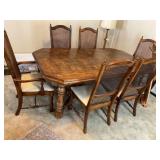 Dining room table and rattan back chairs