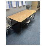 Adjustable table 5 x 30' in hallway