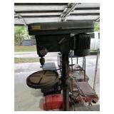 Drill press.  Works