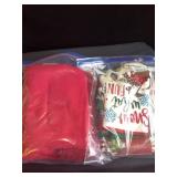 Red table, linens and assorted table, coverings