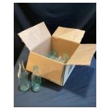 Assorted vintage glass bottles