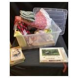 Assorted holiday decor, miscellaneous cookbooks
