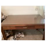 Wooden desk with glass top