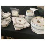 Huge set of China with plates, saucers, cups, etc.