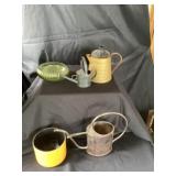 Assorted pots and vintage water cans