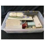 Tote full of candles and assorted Christmas