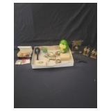Assorted display pieces, antique frogs and