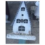 Ornate bird house on stand
