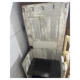 Primitive wooden bench made from old doors