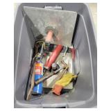 Tote with grease gun , hammer & misc
