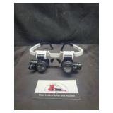 Magnifying wearable glasses