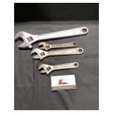Adjustable wrenches