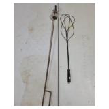 Vintage rug beater and lightning rod