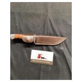 Knife with protective cover