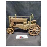 Vintage John Deere cast iron tractor