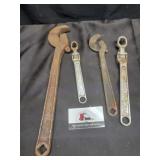 Adjustable wrenches