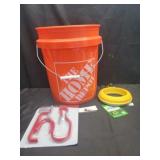 Home depot bucket with hooks, sprinkler & misc