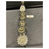Brass horse medallions