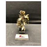 Brass rose