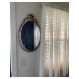 Small oval mirror