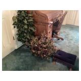 Assorted greenery and artificial flower