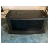 Small black entertainment center with glass doors