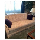 Sofa with two pillows