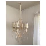Hanging in chandelier with candles