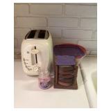 Toaster and containers And coasters and small