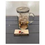 Glass jar of trinkets