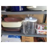 Shelf of griddles, brita & lids