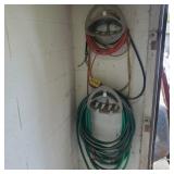 Hoses and Cords on wall