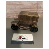 Die -cast metal coin bank, often featuring