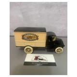 Vintage die-cast toy coin bank designed as a