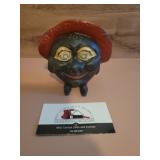 Vintage cast iron smile and save coin bank