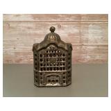 Cast iron bank building coin bank